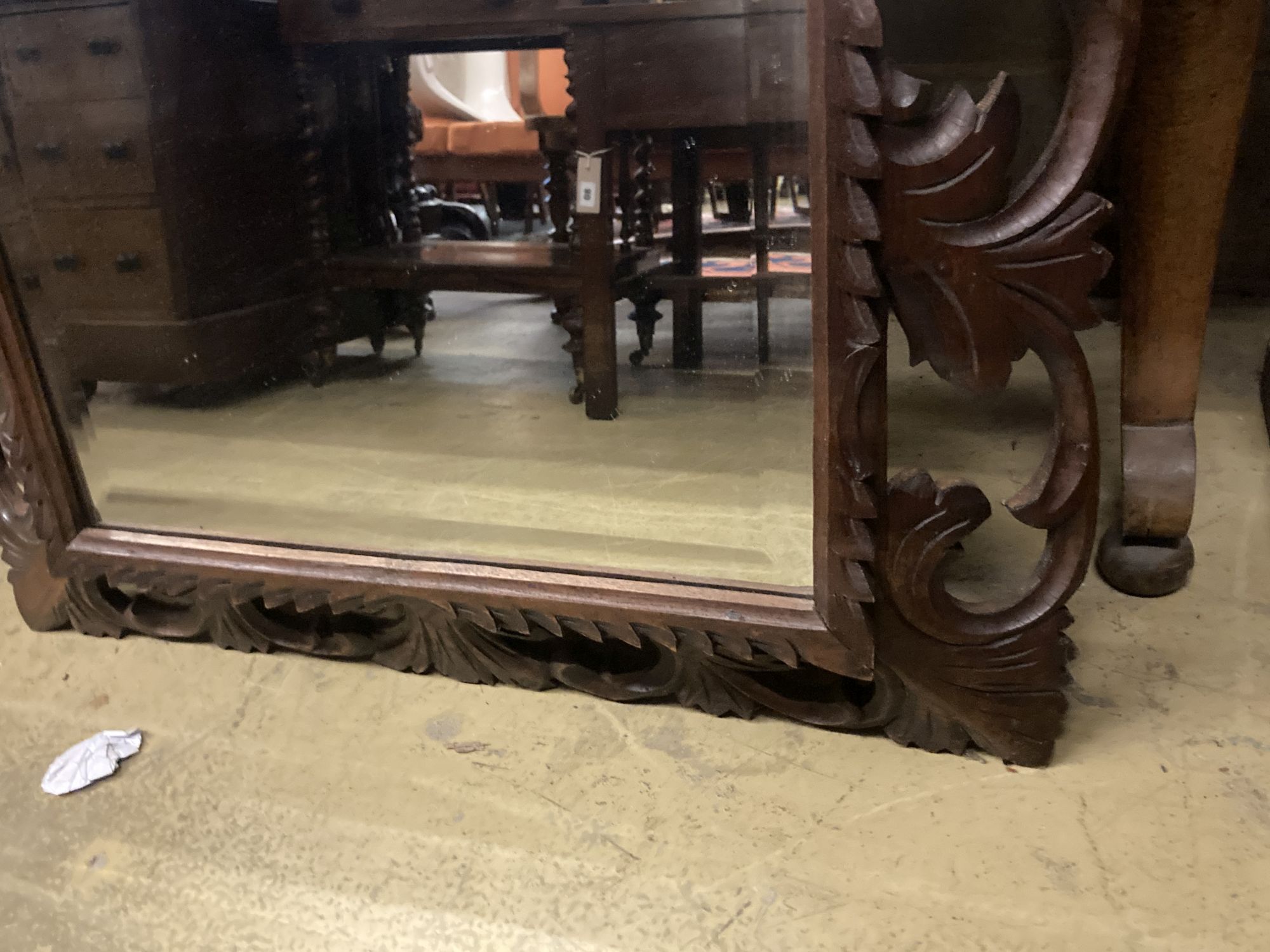 An early 20th century rectangular carved oak wall mirror, width 80cm, 110cm high